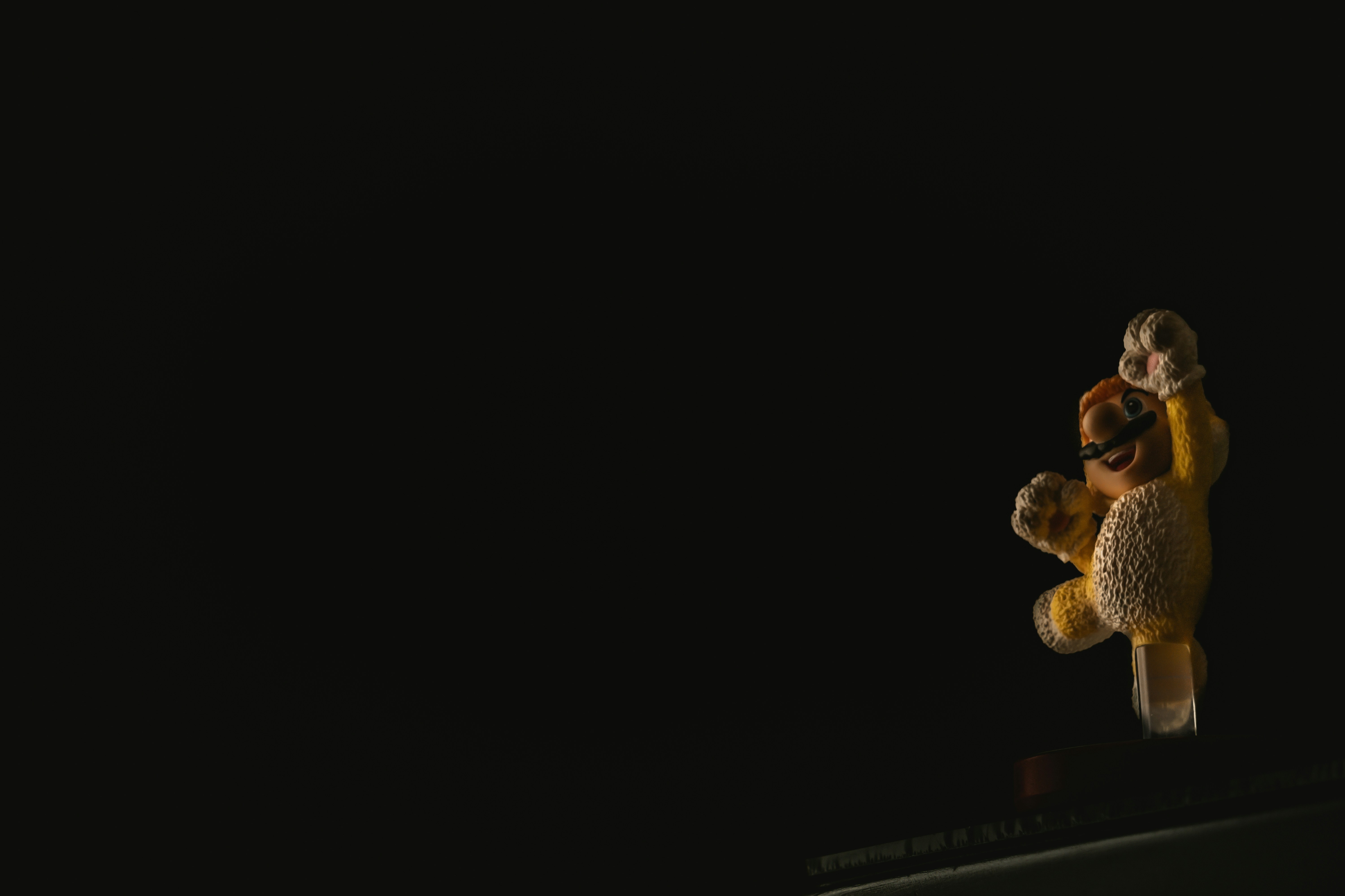 a couple of stuffed animals sitting on top of a table